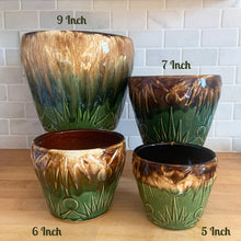 Load image into Gallery viewer, Vintage mid-century Celestial Moon and Star ceramic stoneware garden planter with embossed starburst suns and moons in brown ochre green drip glaze. Robinson Ransbottom Pottery Co., USA, 1960s. This highly collectible garden planter will look gorgeous filled with your favourite greenery or flowers.

In excellent vintage condition, minor age-related wear and crazing, no chips/cracks. See photos for maker&#39;s marks. Sizes: 5, 6, 7 and 9 inches
