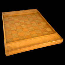 Load image into Gallery viewer, Vintage handmade, wooden chess and checkers game board with a storage drawer at each end with sliding lids, with plenty of room to hold the game pieces. Nicely made with various wood species and includes plastic checkers.

In excellent vintage condition, drawers slide easily.

Measures 16 3/4 x 13 x 1 3/8 inches
