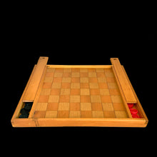 Load image into Gallery viewer, Vintage handmade, wooden chess and checkers game board with a storage drawer at each end with sliding lids, with plenty of room to hold the game pieces. Nicely made with various wood species and includes plastic checkers.

In excellent vintage condition, drawers slide easily.

Measures 16 3/4 x 13 x 1 3/8 inches
