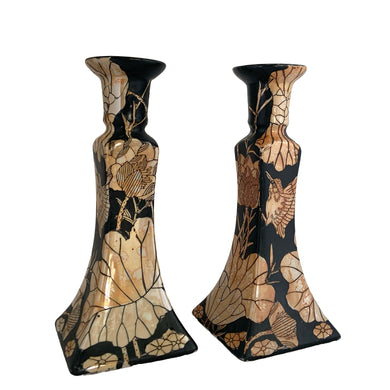 Vintage Chinoiserie style porcelain candle holders decorated in black with peach lustre lily flowers and birds. Crafted in Japan, 1960s. A beautiful complement to any decor style.

In good vintage condition, no chips. Unmarked.

Measures 3 7/8 x 3 7/8 x 8 7/8