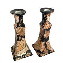 Load image into Gallery viewer, Vintage Chinoiserie style porcelain candle holders decorated in black with peach lustre lily flowers and birds. Crafted in Japan, 1960s. A beautiful complement to any decor style.

In good vintage condition, no chips. Unmarked.

Measures 3 7/8 x 3 7/8 x 8 7/8
