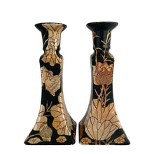 Load image into Gallery viewer, Vintage Chinoiserie style porcelain candle holders decorated in black with peach lustre lily flowers and birds. Crafted in Japan, 1960s. A beautiful complement to any decor style.

In good vintage condition, no chips. Unmarked.

Measures 3 7/8 x 3 7/8 x 8 7/8
