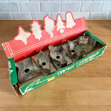 Load image into Gallery viewer, We love sharing vintage Christmas goods that bring back fond memories of baking for the holidays. This set of metal cookie and sandwich cutters has an attached handle for ease of use. Perfect for making Christmas memories with family! In good used vintage condition. In the original well-worn box.
