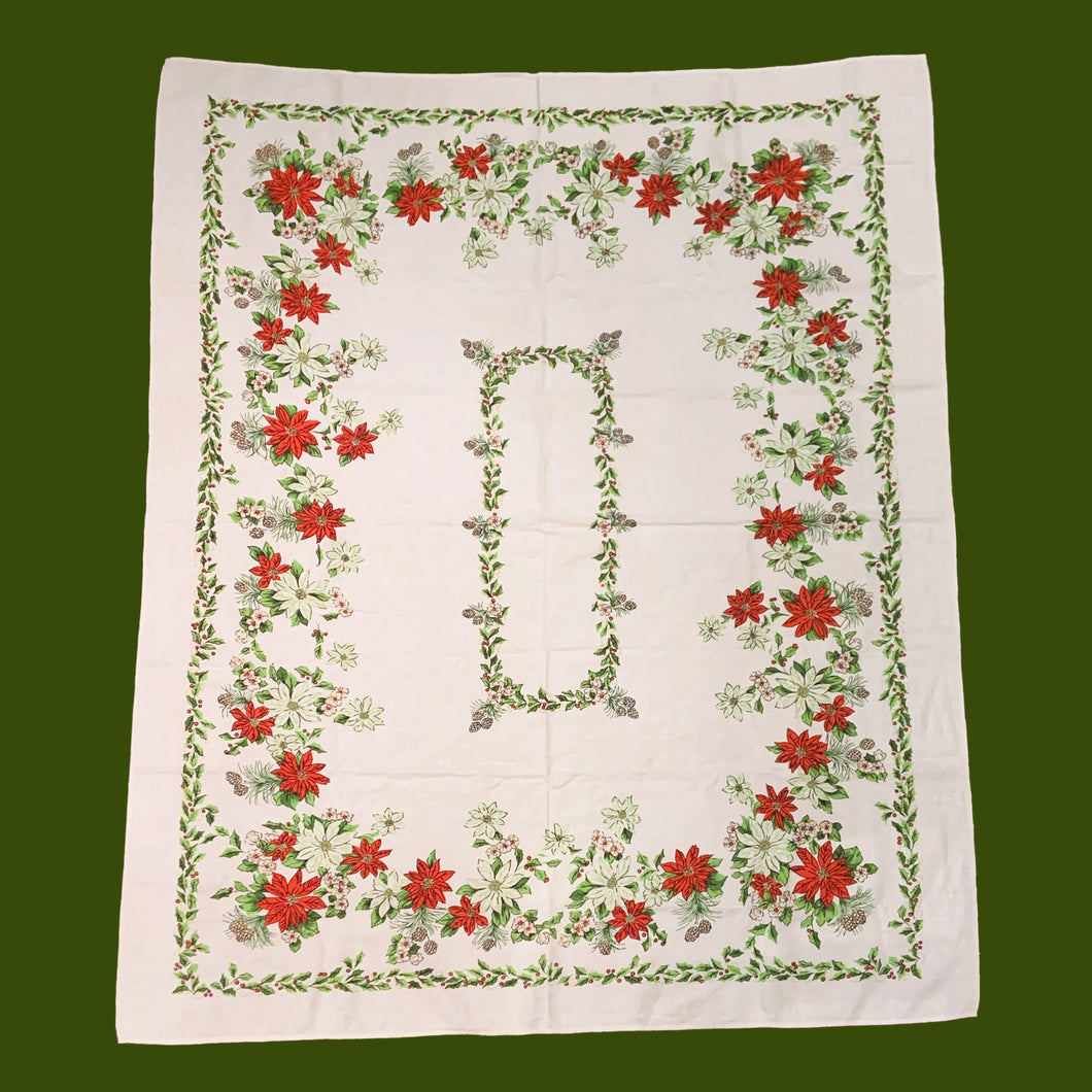 Festive vintage natural cotton Christmas rectangular tablecloth featuring Poinsettia flowers, pine cones and holly border in shades of red, green and brown. A lovely table covering to add festive flair to your holiday celebration!

In excellent condition, free from stains/tears.

Measures 50 x 62 inches