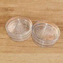 Load image into Gallery viewer, Sweet set of vintage Cristal D&#39;Arques &quot;Tree&quot; clear glass coasters impressed with a Christmas tree. Crafted by JG Durand &amp; Company, France, 1999. The perfect way to protect your furniture with holiday cheer!  New in box. Excellent condition.  Measures 4 1/4 inches
