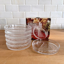 Load image into Gallery viewer, Sweet set of vintage Cristal D&#39;Arques &quot;Tree&quot; clear glass coasters impressed with a Christmas tree. Crafted by JG Durand &amp; Company, France, 1999. The perfect way to protect your furniture with holiday cheer!  New in box. Excellent condition.  Measures 4 1/4 inches

