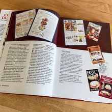 Load image into Gallery viewer, Borden is known for its fabulous dairy products. This hardcover cookbook focuses on recipes using Eagle Brand Sweetened Condensed Milk. Its 216 pages are filled with amazing  recipes along with many colour photographs. Published for Borden Inc., by Publications International USA, 1989.   In great vintage condition with normal age-related yellowing.   
