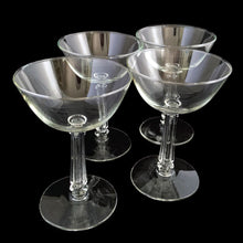 Load image into Gallery viewer, These vintage mid-century 3002 clear champagne or tall sherbet glasses feature a stem that replicates a delicate grecian style column. Crafted by Libbey Glass, USA, 1950s. This stemware will add a touch of Hollywood glam to any occasion. You bar cart will thank you...cheers!  In excellent condition, no chips.&nbsp;  Measures 3 3/4 x 5 1/2 inches  Capacity 6 ounces
