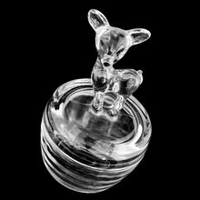 Load image into Gallery viewer, Vintage Jeannette Glass clear glass deer fawn powder jar, angled view showing embossed fawn relief and lid knob
