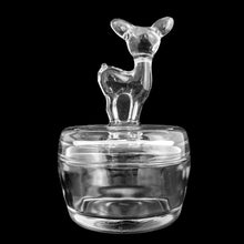 Load image into Gallery viewer, Rear view detail of embossed deer fawn relief on vintage Jeannette Glass clear glass powder jar
