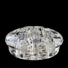 Load image into Gallery viewer, Clear glass flower frog side view showing overhang lip and 5 bun feet, 3 inch diameter
