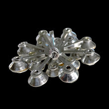 Load image into Gallery viewer, Side profile of vintage clear rhinestone cluster brooch showing depth of silver-tone spoke frame and rollover safety pin clasp
