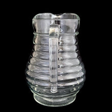 Load image into Gallery viewer, Close-up of open handle on vintage ribbed beehive glass pitcher, 18 oz, vintage tableware
