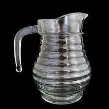 Load image into Gallery viewer, Opposite side profile of vintage ribbed beehive glass pitcher, 18 oz, showing open handle and stacked rib detail
