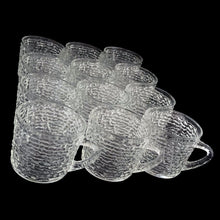 Load image into Gallery viewer, Vintage clear Soreno pressed glass punch bowl and 12 matching cups featuring a textured bark surface. Crafted by Anchor Hocking, USA, 1966 - 1970. Perfect for serving your favourite concocted beverages.

All in excellent condition, no chips.

Bowl measures 12 3/4 x 6 inches

Cups measure 3 x 2 5/8 inches
