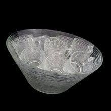 Load image into Gallery viewer, Vintage clear Soreno pressed glass punch bowl and 12 matching cups featuring a textured bark surface. Crafted by Anchor Hocking, USA, 1966 - 1970. Perfect for serving your favourite concocted beverages.

All in excellent condition, no chips.

Bowl measures 12 3/4 x 6 inches

Cups measure 3 x 2 5/8 inches
