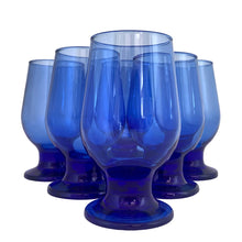 Load image into Gallery viewer, Vintage cobalt blue chunky stem footed cocktail glass tumbler. Mark appears to be Libbey. A nice size for juice, whiskey, wine....whatever you please!

In excellent condition, no chips.

Measures 2 5/8 x 5 inches

Capacity 6 ounces
