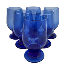 Load image into Gallery viewer, Vintage cobalt blue chunky stem footed cocktail glass tumbler. Mark appears to be Libbey. A nice size for juice, whiskey, wine....whatever you please!

In excellent condition, no chips.

Measures 2 5/8 x 5 inches

Capacity 6 ounces
