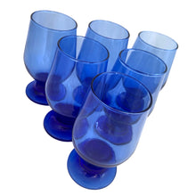 Load image into Gallery viewer, Vintage cobalt blue chunky stem footed cocktail glass tumbler. Mark appears to be Libbey. A nice size for juice, whiskey, wine....whatever you please!

In excellent condition, no chips.

Measures 2 5/8 x 5 inches

Capacity 6 ounces
