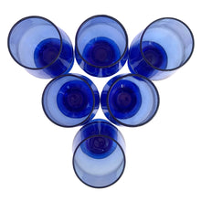Load image into Gallery viewer, Vintage cobalt blue chunky stem footed cocktail glass tumbler. Mark appears to be Libbey. A nice size for juice, whiskey, wine....whatever you please!

In excellent condition, no chips.

Measures 2 5/8 x 5 inches

Capacity 6 ounces
