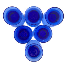 Load image into Gallery viewer, Vintage cobalt blue chunky stem footed cocktail glass tumbler. Mark appears to be Libbey. A nice size for juice, whiskey, wine....whatever you please!

In excellent condition, no chips.

Measures 2 5/8 x 5 inches

Capacity 6 ounces
