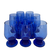 Load image into Gallery viewer, Vintage cobalt blue chunky stem footed cocktail glass tumbler. Mark appears to be Libbey. A nice size for juice, whiskey, wine....whatever you please!

In excellent condition, no chips.

Measures 2 5/8 x 5 inches

Capacity 6 ounces
