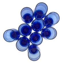 Load image into Gallery viewer, Vintage cobalt blue chunky stem footed cocktail glass tumbler. Mark appears to be Libbey. A nice size for juice, whiskey, wine....whatever you please!

In excellent condition, no chips.

Measures 2 5/8 x 5 inches

Capacity 6 ounces
