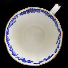 Load image into Gallery viewer, Classic &quot;Mikado&quot; flat cup and saucer with asian themed design in cobalt blue on white bone china with gold gilt rim. Craft by Royal Crown Derby, England, circa 1940s.  In excellent condition, free from chips/cracks.  Teacup measures 3 x 2 3/8 inches | Saucer measures 5 1/2 inches
