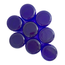 Load image into Gallery viewer, Set of eight vintage cobalt blue Premiere rocks glasses. Crafted by Libbey Glass, USA, circa 1990s. A striking addition to your everyday drinkware or barware collection.

In excellent condition, free from chips. Marked the Libbey L on the bottom.

Measures 3 x 3 3/8 inches

Capacity 10 ounces
