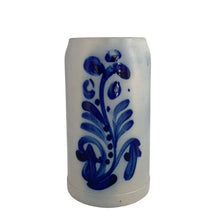 Load image into Gallery viewer, Front view and close-up detail of the cobalt blue hand-painted scrollwork and salt glaze texture on a vintage German Westerwald stoneware beer stein, showing the matte grey ceramic surface and glossy glaze pooling
