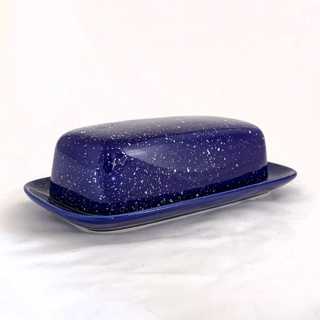 Fabulous cobalt blue with white speckles covered butter dish. Produced by Stoneware Sensation, Japan, circa 1970.  In excellent condition, no chips or cracks.  Measures 8 x 4 1/2 x 2 1/2 inches