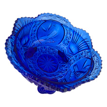 Load image into Gallery viewer, Large vintage cobalt blue love birds 3-footed, lidded candy dish, Byrdes reproduction. A licensed reproduction of the Hofbauer Byrdes model, 1990s. A gorgeous vessel to stash candy, keys, cotton balls and more!!!

In vintage condition with minor smooth chip to the outer rim and minor flea bites to both pieces which do not detract from the beauty of this piece thanks to the deep colour of the glass which tends to hide small issues.

Measures 7 1/2 x 7 1/2 inches
