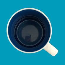 Load image into Gallery viewer, Top view of Starbucks Boston mug showing the navy blue glazed interior and white rim
