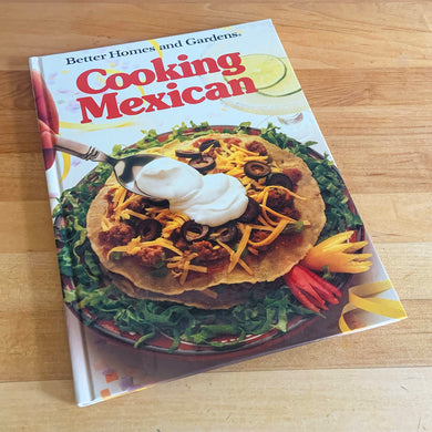 Better Homes and Gardens is known for its fabulous cookbooks. This hardcover cookbook focuses on Cooking Mexican recipes. Its 96 pages are filled with amazing  recipes along with many colour photographs. Originally published by Meredith Corporation, USA, 1986. This is the second printing, 1986.   In great vintage condition with normal age-related yellowing.