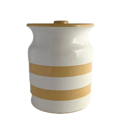 Pottery never looked this good! This vintage Original Cornish Kitchenware lidded storage canister features cream and ochre stripes. Restyled by Judith Onions DesRCA and crafted by T.G. Green, England, circa 1960s.  In excellent condition, free from chips/cracks.  Measures 4 1/8 x 5 3/8 inches