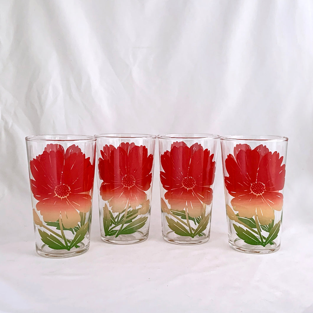 A delightful set of four highly collectible vintage Swanky Swig promotional glass tumblers featuring the tri-colour red yellow green 