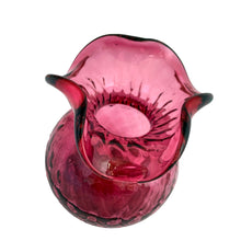 Load image into Gallery viewer, This lovely hand blown vintage cranberry optic glass vase with tri-fold edge, features a striking quilted diamond pattern which extends to the bottom of the vessel. Expertly crafted by Rossi Art Glass, Canada, circa 1980s. Perfect for displaying a small floral bouquet. A wonderful way to liven up your home&#39;s decor!  In excellent condition, free from chips.  Measures 3 3/4 x 5 inches   
