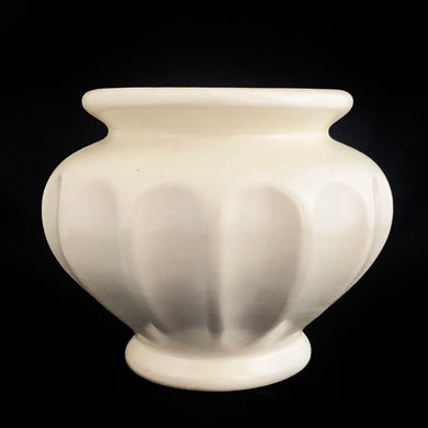 We can't resist this type of ceramic planter vase simply because of the creaminess of the off-white glaze on this round Grecian style urn planter. Produced by Haeger U.S.A., circa 1970. Fill this beauty with houseplants, succulents or a beautiful bouquet of flowers. Whatever you choose it'll make a fabulous addition to your decor!  In excellent condition, no chips or cracks. Stamped on the bottom with 