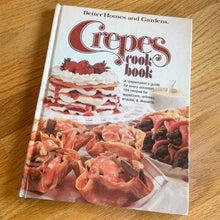 Load image into Gallery viewer, Better Homes and Gardens is known for its fabulous cookbooks. This hardcover cookbook focuses on crepes recipes. Its 96 pages are filled with amazing  recipes along with many colour photographs. Originally published by Meredith Corporation, USA, 1976. First edition, third printing 1977.   In great vintage condition with normal age-related yellowing.
