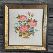 Load image into Gallery viewer, This beautifully embroidered still life of a floral bouquet of pinks, blues and greens on ecru linen was lovingly stitched by the owners mother, Margaret White who gave it to her daughter as a Christmas gift in 1975 (provenance is hand written on the back of the piece.  In excellent condition.  Approximately 13 5/8 x 14 5/8 inches   
