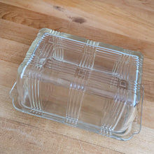 Load image into Gallery viewer, We are loving this vintage clear depression glass &quot;Criss Cross&quot; covered butter dish. Produced by Hazel-Atlas Glass, USA, circa 1930s. Perfect for the vintage kitchen enthusiast!&nbsp;  In good vintage condition, lid is free from chips, interior rim of the dish flea bites.  Measures 7 x 4 x 3 1/4 inches

