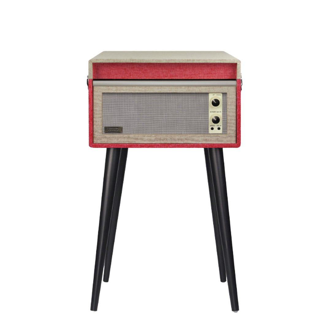 Vintage retro mid-century modern style Dansette Bermuda Record Player Turntable by Crosley in coral pink with black legs. Crank up the nostalgia and spin some vinyl or use as a funky prop for photos or TV and movie production!

In working order, but the sound output needs attention, or, use the RCA outputs on the back of the unit to hook up external self-powered speakers. Alternatively, it may just need a new needle.

Overall dimensions 15 1/4 x 16 1/2 x 26 1/4 inches (incl. legs with cover closed)