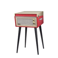 Load image into Gallery viewer, Vintage retro mid-century modern style Dansette Bermuda Record Player Turntable by Crosley in coral pink with black legs. Crank up the nostalgia and spin some vinyl or use as a funky prop for photos or TV and movie production!

In working order, but the sound output needs attention, or, use the RCA outputs on the back of the unit to hook up external self-powered speakers. Alternatively, it may just need a new needle.

Overall dimensions 15 1/4 x 16 1/2 x 26 1/4 inches (incl. legs with cover closed)
