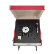 Load image into Gallery viewer, Vintage retro mid-century modern style Dansette Bermuda Record Player Turntable by Crosley in coral pink with black legs. Crank up the nostalgia and spin some vinyl or use as a funky prop for photos or TV and movie production!

In working order, but the sound output needs attention, or, use the RCA outputs on the back of the unit to hook up external self-powered speakers. Alternatively, it may just need a new needle.

Overall dimensions 15 1/4 x 16 1/2 x 26 1/4 inches (incl. legs with cover closed)
