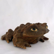 Load image into Gallery viewer, Vintage Cryptomeria carved wood frog figurine. Crafted in Japan, 1970s. This style of carving was very popular and makes a nice decor piece for the nature lover.

In excellent condition. Marked Japan.

Measures 6 x 4 1/2 x 2 1/2 inches
