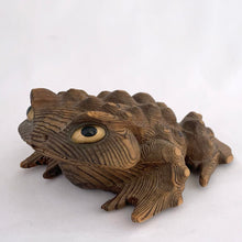 Load image into Gallery viewer, Vintage Cryptomeria carved wood frog figurine. Crafted in Japan, 1970s. This style of carving was very popular and makes a nice decor piece for the nature lover.

In excellent condition. Marked Japan.

Measures 6 x 4 1/2 x 2 1/2 inches

