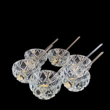 Load image into Gallery viewer, Vintage set of six crystal salt cellars and spoons. Crafted by Bohemia Crystal, circa 1950s. A lovely addition to your tablescape. New in box in excellent vintage condition. Each spoon is wrapped and has the original yellow sticker which reads Bohemia Crystal, Made in Czechoslovakia. Salt cellars measure 1 5/8 x 7/8 inches. Spoons measure 2 3/4 inches
