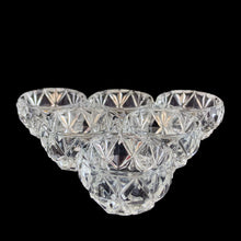 Load image into Gallery viewer, Vintage set of six crystal salt cellars and spoons. Crafted by Bohemia Crystal, circa 1950s. A lovely addition to your tablescape. New in box in excellent vintage condition. Each spoon is wrapped and has the original yellow sticker which reads Bohemia Crystal, Made in Czechoslovakia. Salt cellars measure 1 5/8 x 7/8 inches. Spoons measure 2 3/4 inches
