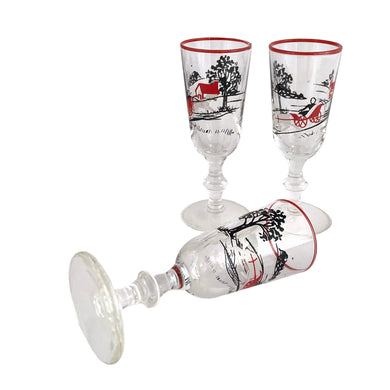 Vintage mid-century Currier & Ives Horse and Carriage Pony spindle stemmed brandy glasses featuring a pastoral scene with horse and carriage in red, white and black.

Crafted by Libbey Glass, USA, 1949 - 1960s. This stemware will add a touch of nostalgia to any occasion. You bar cart will thank you...cheers!

In excellent condition, no chips.

Measures 1 3/8 x 3 7/8 inches

Capacity 1 ounce