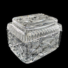 Load image into Gallery viewer, Elegant vintage cut crystal lidded cigarette box. Crafted by Bohemia Crystal, Czechoslovakia, 1970s. This box provides a decorative way to store cigarettes with the lid functioning as an ashtray. Not a smoker? Use this versatile elegant box to store playing cards, candies or trinkets. Add this statement piece to your home decor or give as a gift.

In excellent condition, no chips.

Measures 4 1/2 x 3 3/8 x 3 1/2 inches
